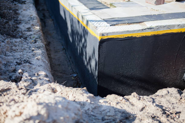 Professional Waterproofing technician working in Collins, WI
